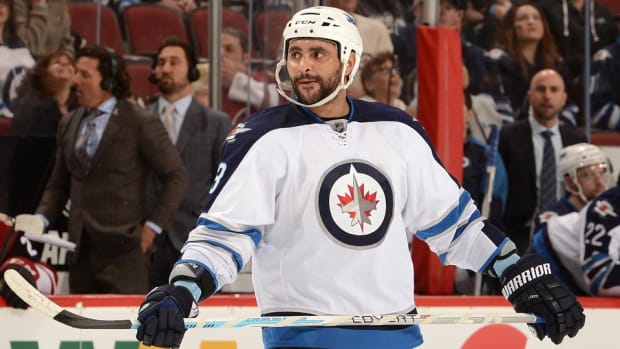 Dustin-Byfuglien-Norm-Hall.jpg